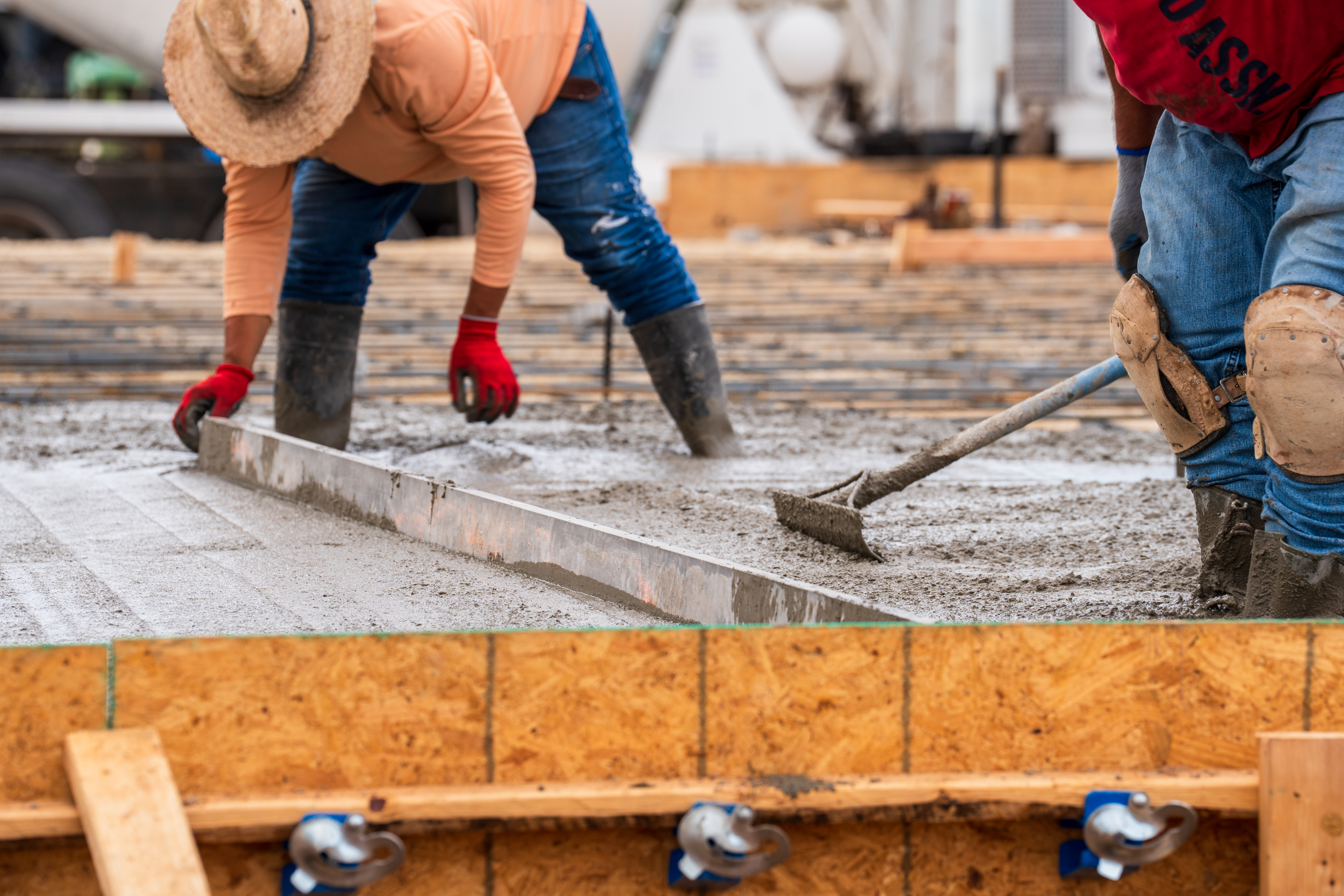 Screeding and finishing a slab